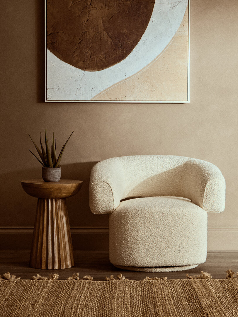Oliveto Ivory Bouclé Swivel Armchair – Curved Sculptural Seating for Design-Led Workspaces
