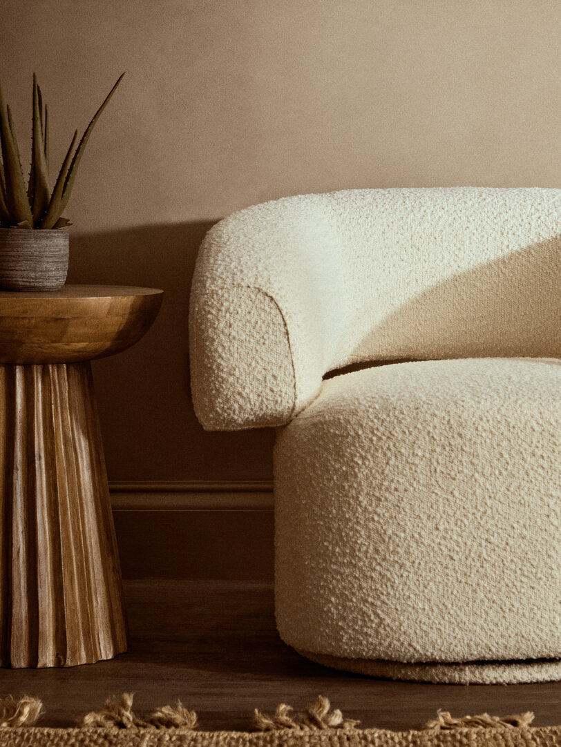 Oliveto Ivory Bouclé Swivel Armchair – Curved Sculptural Seating for Design-Led Workspaces